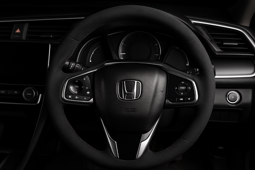 Enhanced Honda steering wheel with Alcantara cover and black stitching for homepage display