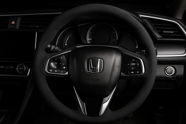 Enhanced Honda steering wheel with Alcantara cover and black stitching for homepage display